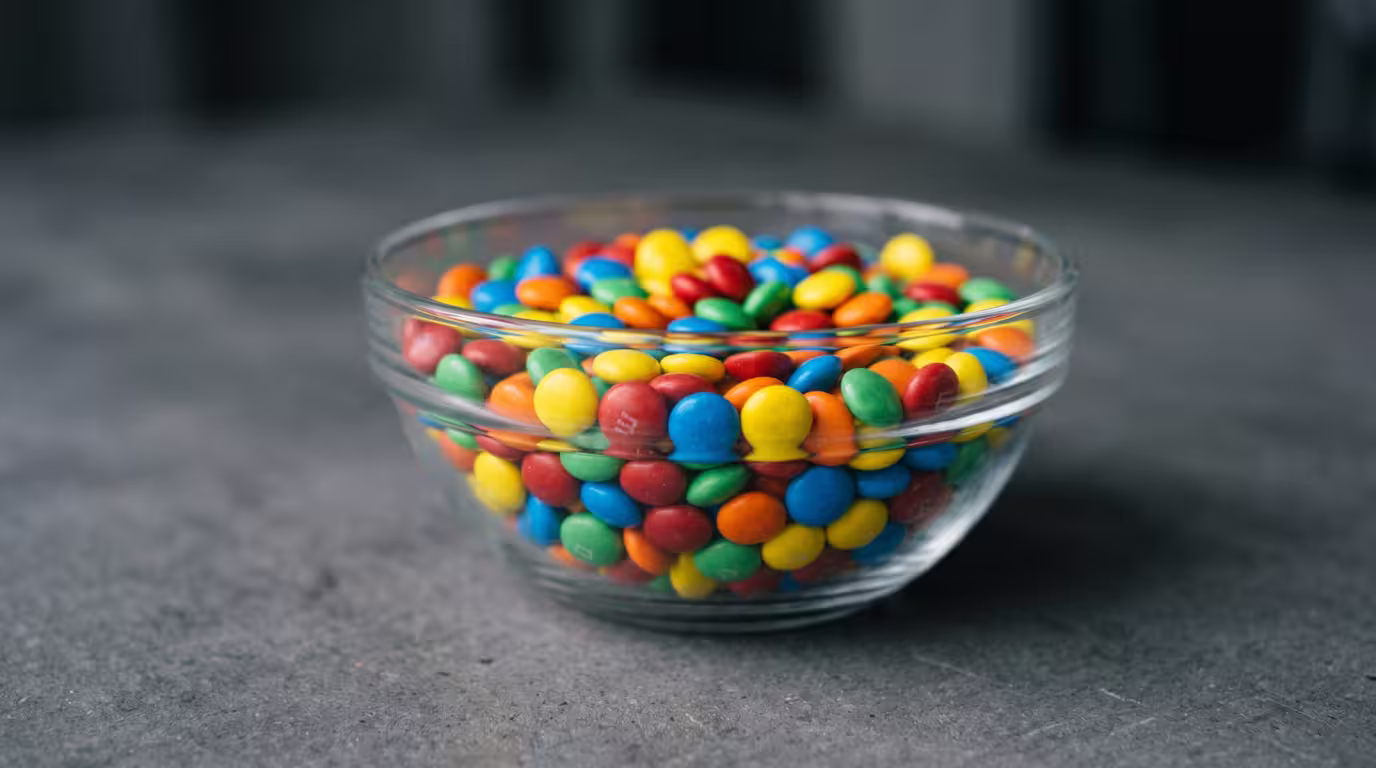 A bowl of colourful candies with no brown ones, referencing the Van Halen rider story