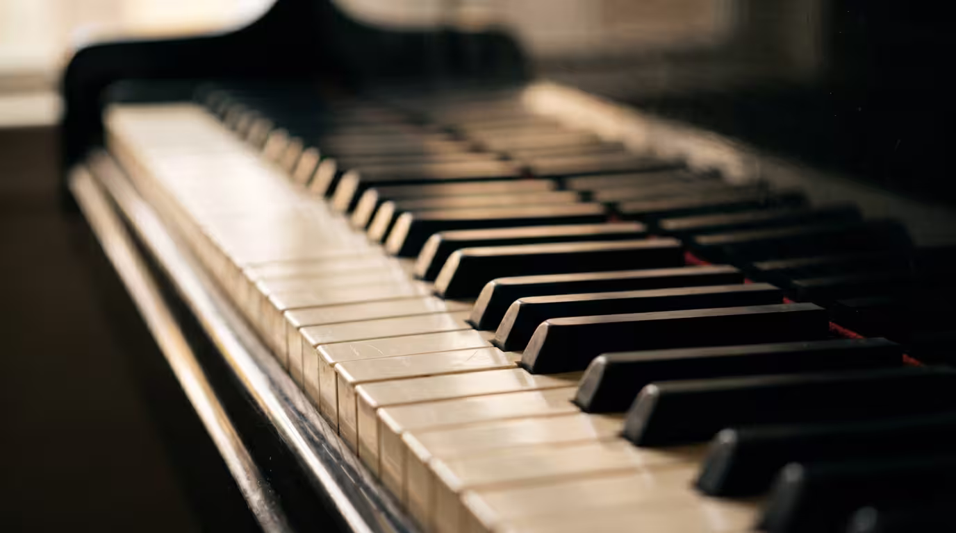 Close-up of a piano keyboard showing the repeating pattern of white and black keys